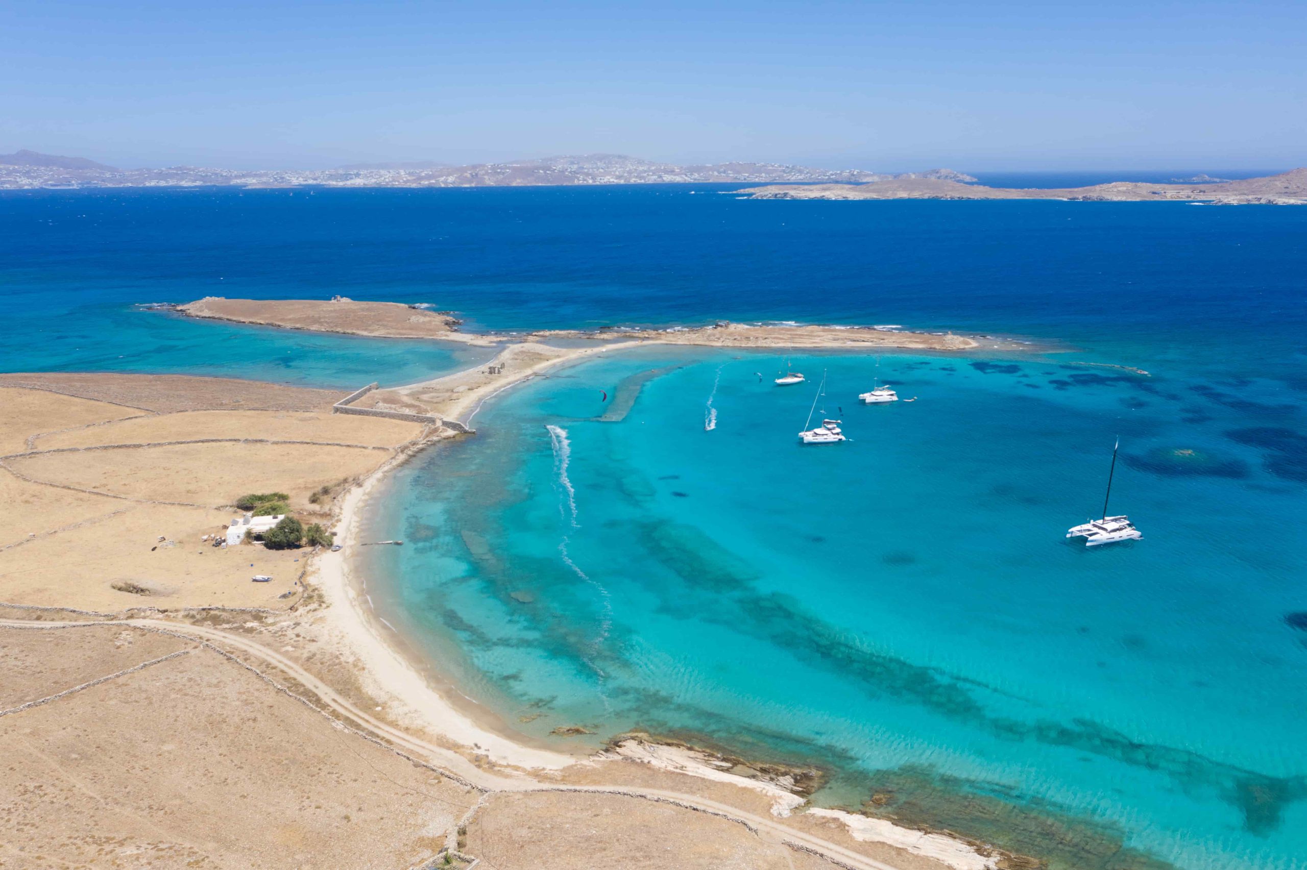 Kitesurfing in Rinia. Wild Kitesurf spot near Mykonos